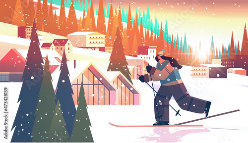 skier woman sliding down sportswoman skiing doing activities winter vacation concept sunset snowfall landscape