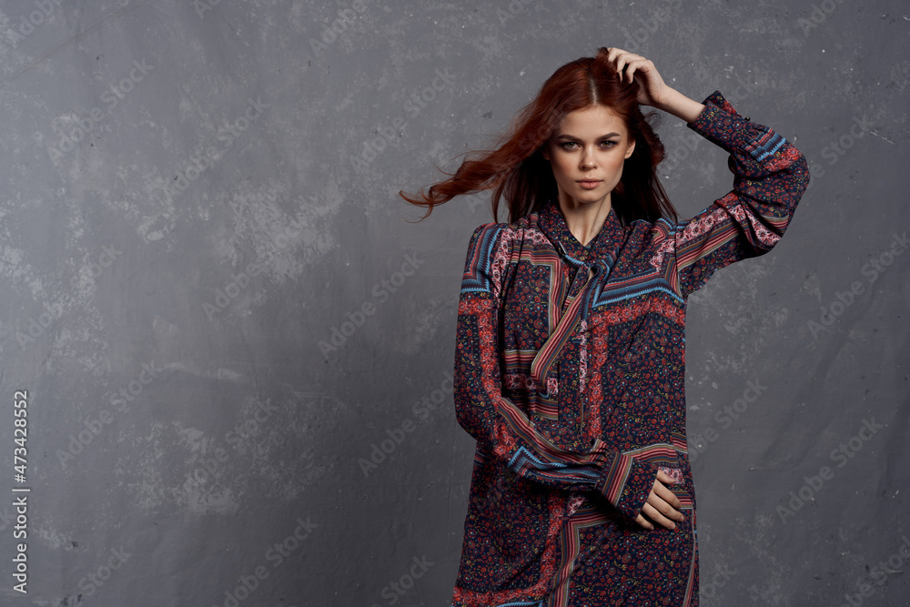 woman in coat fashionable clothes glamor red hair model