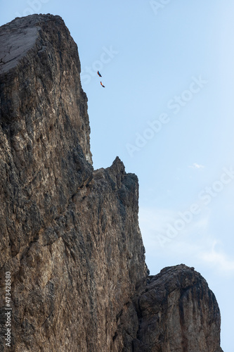Wingsuit Base Jumpers jumping off a mountain n°2 photo