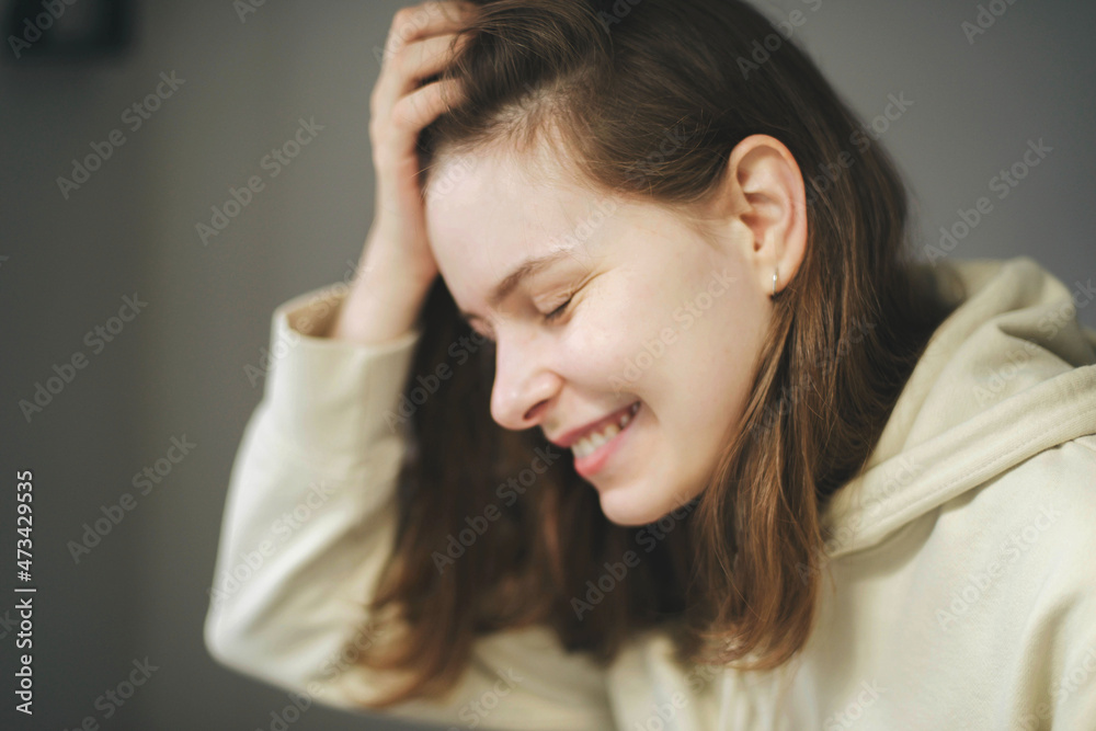 Portrait of smilling woman at home