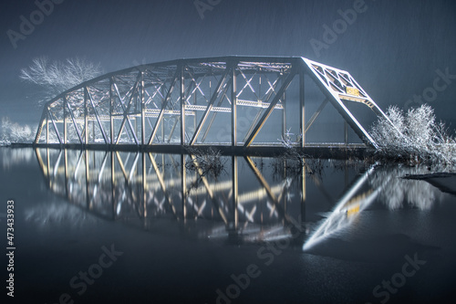 The Flooded Nebraska Bridge At Night in Snowstorm