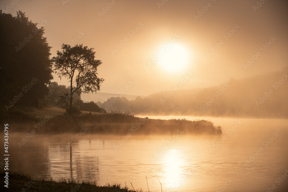 Idyllic WV Lake during Foggy Colorful Sunrise Idyllic WV Lake during Foggy Colorful Sunrise