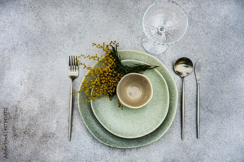 Spring mimosa flowers used in table setting decoration