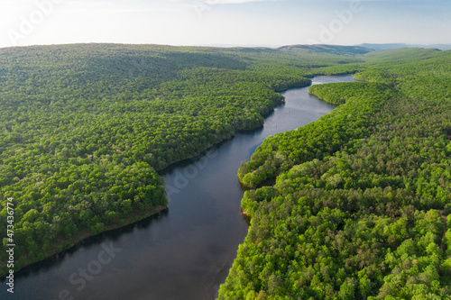 Aerials Over Big Lake in Forest Covered Hills