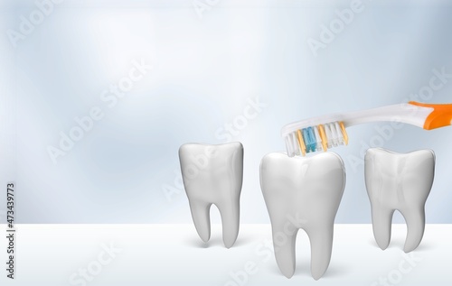 Flossing and brushing your teeth concept  Cavity  yellow and healthy teeth model