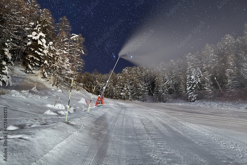 Ski slopes at night under the stars in the sky Ski slopes at night under the stars in the sky