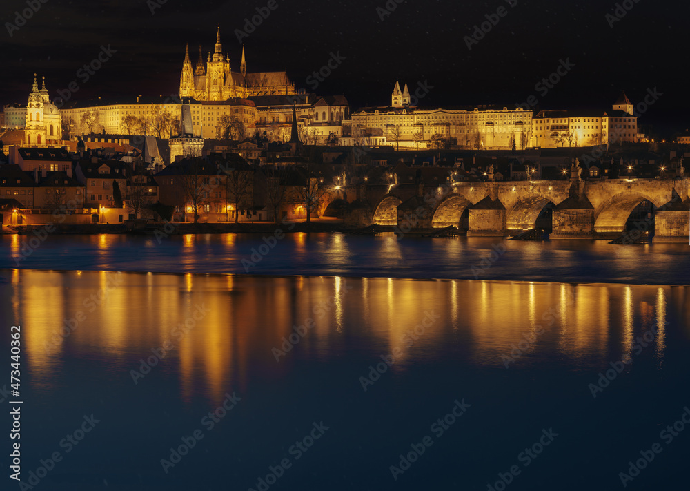 night view of prague castle and st. vitus and cathedral bridge on ece vltava at night in the center of prague