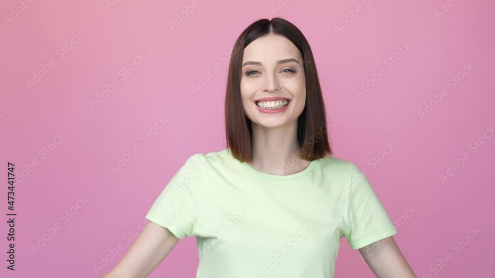 Charming lady make v sign send air kiss weekend isolated pink color background Charming lady make v sign send air kiss weekend isolated pink color background