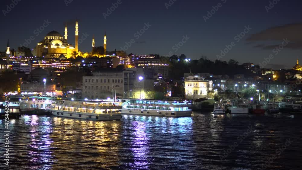 Panoramic Cityscape View of Bosporus and Illuminated Mosque in Istanbul at Night Panoramic Cityscape View of Bosporus and Illuminated Mosque in Istanbul at Night