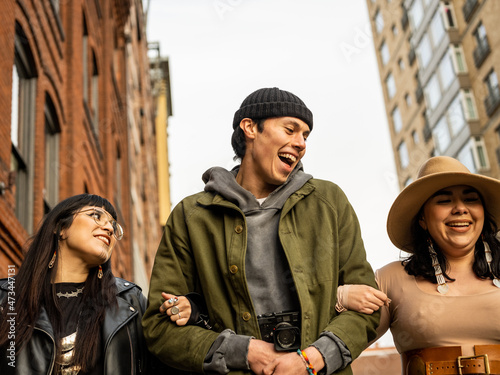 Photography Young Indigenous friends walking outdoors