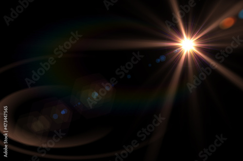 Natural, Sun flare on the black background photo