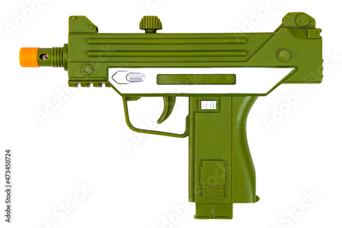 Green toy submachine gun on a white background, isolated image