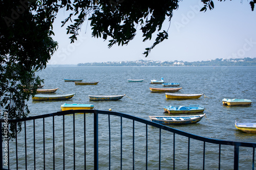 Boats in the upper lake at Bhopal which is also known as 'city of lakes'. photo