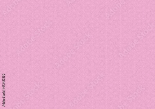 ピンク色の和柄模様（麻の葉）の和紙の質感のある背景