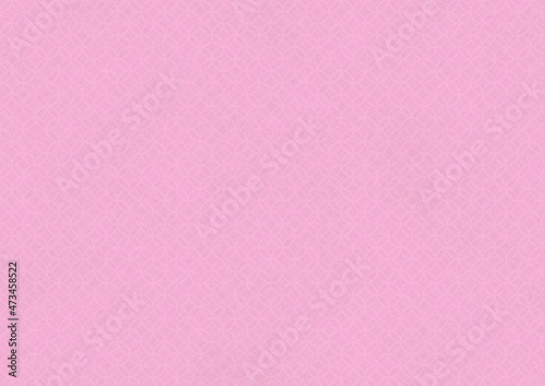 ピンク色の和柄模様（七宝）の和紙の質感のある背景
