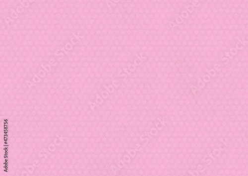 ピンク色の和柄模様（亀甲）の和紙の質感のある背景