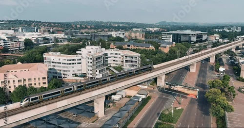 Aerial view of the Gautrain approaching Centurion station, Pretoria, South Africa photo