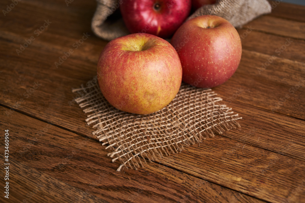 apples on a wooden table vitamins fresh fruits organic apples on a wooden table vitamins fresh fruits organic