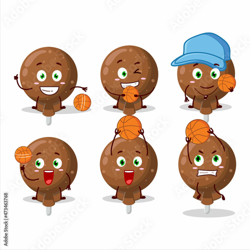 Talented orange lolipop wrapped cartoon character as a basketball athlete
