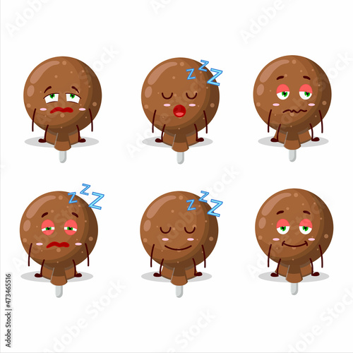 Cartoon character of orange lolipop wrapped with sleepy expression