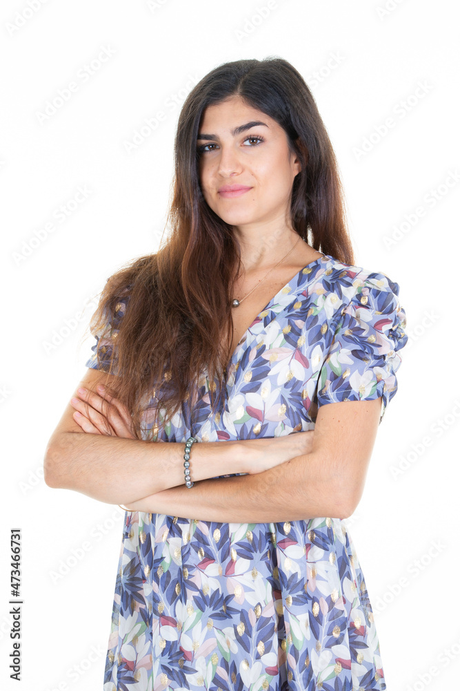 beautiful cheerful slim girl smiling businesswoman arms crossed in blue white flowers dress on white background beautiful cheerful slim girl smiling businesswoman arms crossed in blue white flowers dress on white background