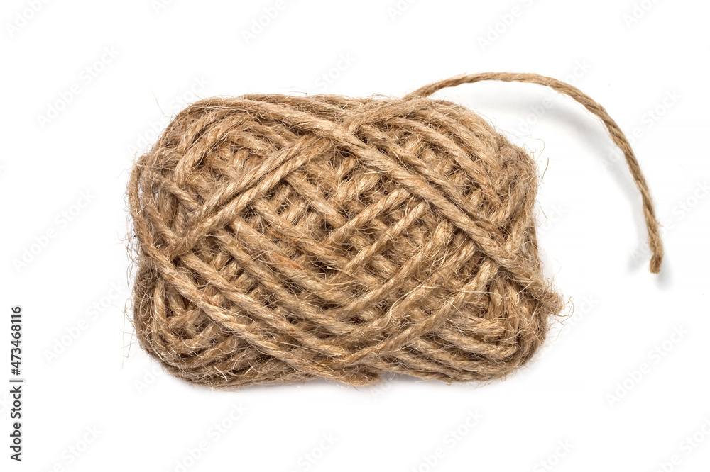 A coil of twine close-up on a white background. A coil of twine close-up on a white background.
