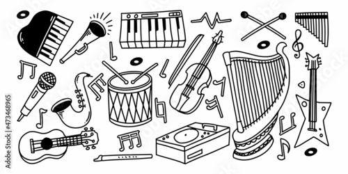 Set of acoustic music elements in childish doodle hand drawn style isolated on white background. photo