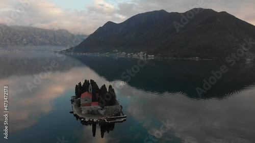 Evening flight over the island of Gospa od Skrpela