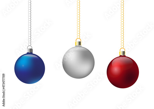 Three red, silver and blue Christmas baubles.