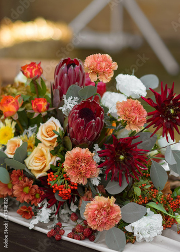 Wallpaper Mural A very nicely decorated wedding table appointments with beautiful decor with plates and serviettes in spring garden. Beautiful flowers on table in wedding day. The elegant dinner table. Torontodigital.ca