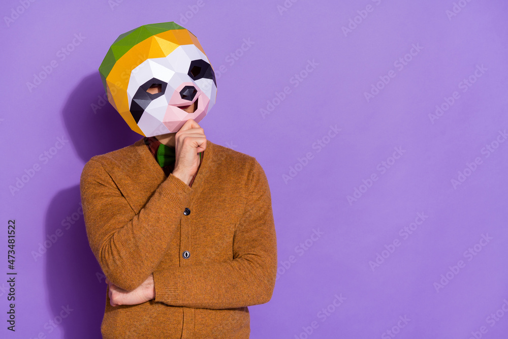 Photo of young man hand touch chin wonder think look empty space isolated over purple color background