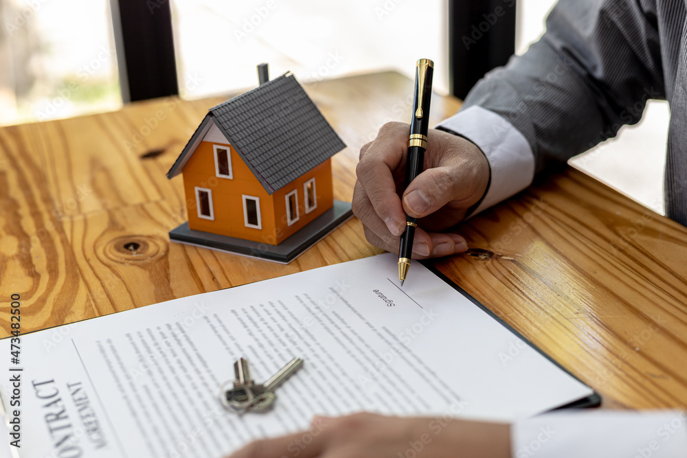 A salesperson of a housing project is drafting a sales contract for a