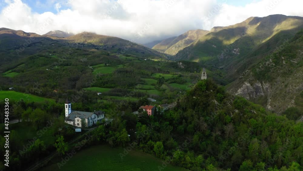 Aerial Backward Beautiful Shot Of Built Structure On Hills Against Clouds Sky - Apennine Mountains, Italy Aerial Backward Beautiful Shot Of Built Structure On Hills Against Clouds Sky - Apennine Mountains, Italy