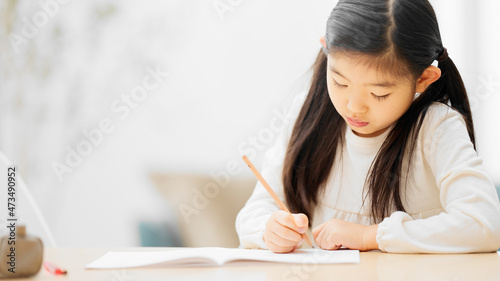Foto 勉強をしている女の子