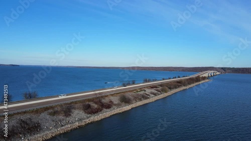 Wallpaper Mural Aerial footage of a bridge over water and a speed boat passing by Torontodigital.ca