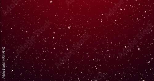 Flying snow on a dark red background. 4K motion graphics looped
