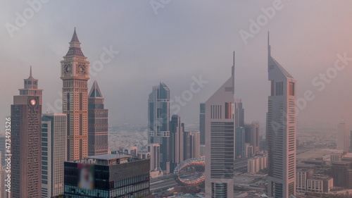 Skyscrapers on Sheikh Zayed Road and DIFC morning timelapse in Dubai  UAE.