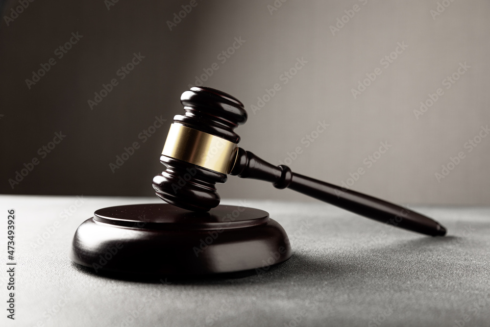 Judge's gavel on dark background, top view. Law concept Judge's gavel on dark background, top view. Law concept