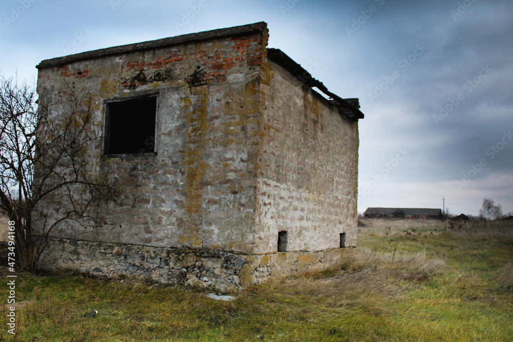 spooky deteriorated abandoned house on a cloudy dark day spooky deteriorated abandoned house on a cloudy dark day