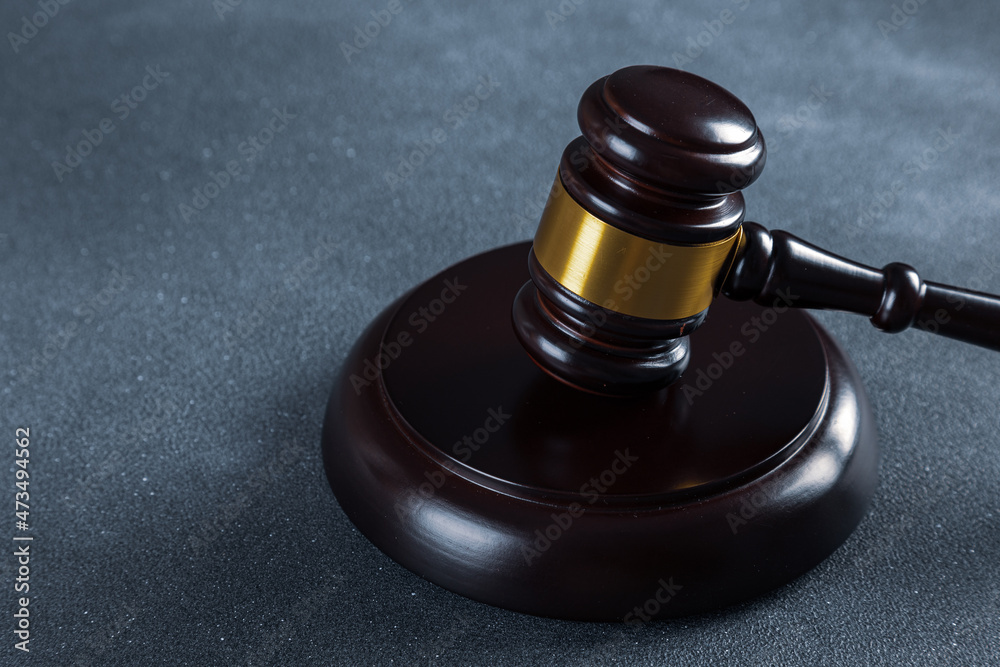 Law and justice. Wooden judge gavel, close-up view. Law and justice. Wooden judge gavel, close-up view.
