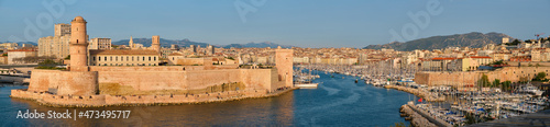 Yachts coming to Marseille Old Port on sunset. Marseille, France