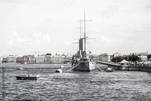 Towage of a historical cruiser Aurora to a place of repair in dock, St.-Petersburg, Russia