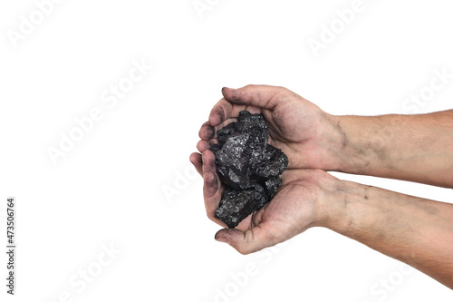 Handful coal in palms and hands on white background.