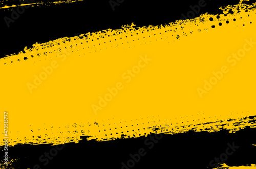 Black and yellow grungy background with place for your text photo