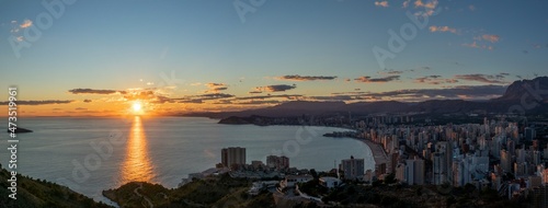 Beach of Benidorm city during sunset in Spain