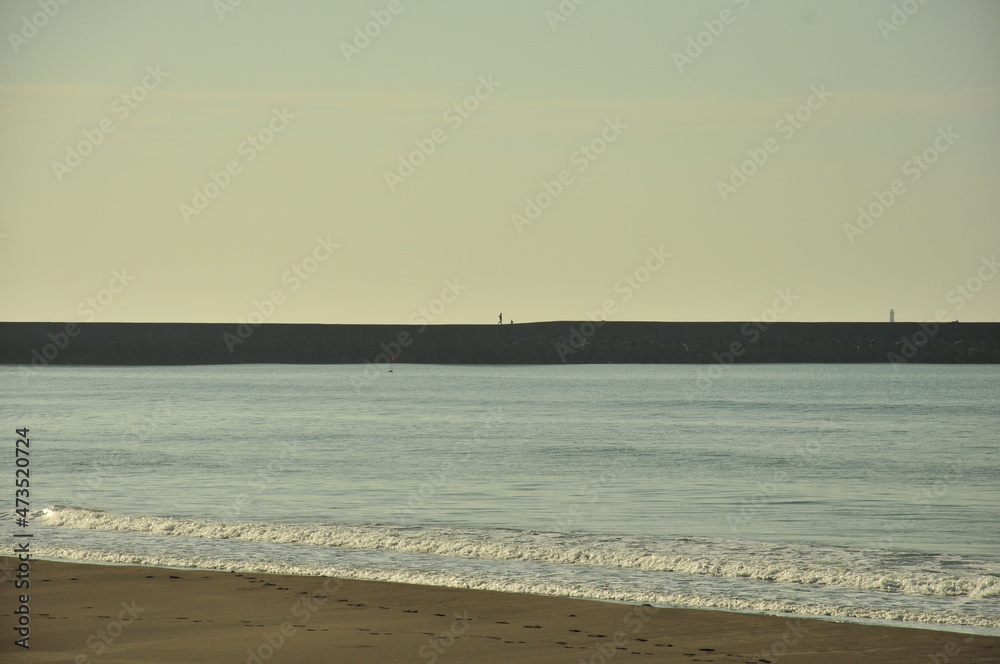 levee with a man walking on it
