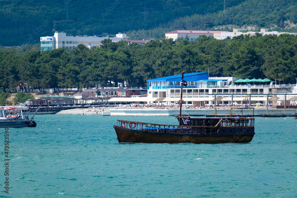 Boat in the sea against the background of mountains. Boat in the sea against the background of mountains.
