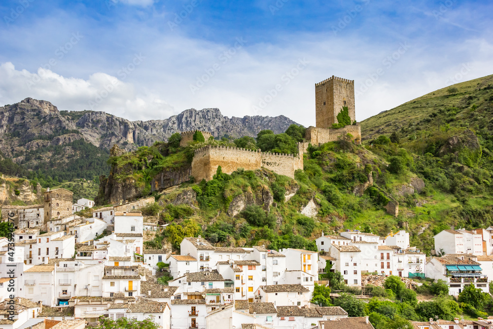 Historic castle and traditional white houses in Cazorla, Spain