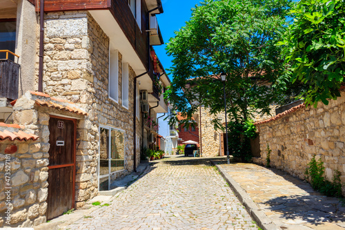 Fototapeta Naklejka Na Ścianę i Meble -  Narrow street of the old town of Nessebar in Bulgaria