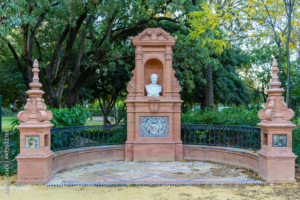 Roundabout to the writer Benito Más y Prat born in Écija, sited in María Luisa park, Seville, Andalusia, Spain